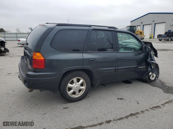 2004 GMC Envoy SLE with VIN 1GKDS13S942432115, listed as a Copart auction lot 43817125 with 147,228 mi miles and Salvage Title. Bid and sale history available at carsss.com. Image 3.