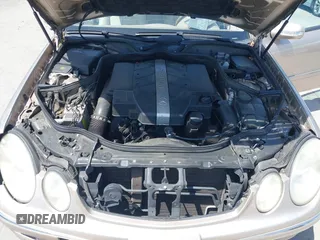2003 Mercedes-Benz E-Class 3.2L with VIN WDBUF65JX3A236768, listed as a IAAI auction lot 42094824 with 251,896 mi miles. Bid and sale history available at carsss.com. Image 10.