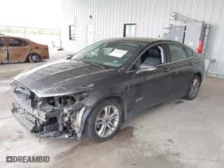 2016 Ford Fusion Energi Titanium with VIN 3FA6P0SU9GR103245, listed as a IAAI auction lot 41888435 with 123,975 mi miles. Bid and sale history available at carsss.com. Image 17.