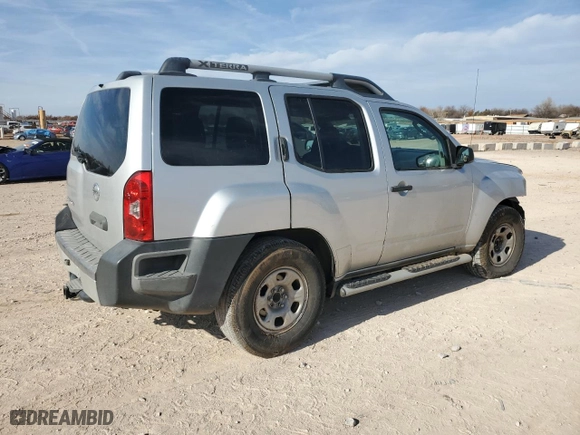 2012 Nissan Xterra X with VIN 5N1AN0NU7CN801061, listed as a Copart auction lot 84755984 with 210,104 mi miles and Salvage Title. Bid and sale history available at carsss.com. Image 3.