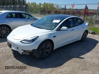 2023 Tesla Model 3 z VIN 5YJ3E1EA1PF558926, wystawiony jako IAAI lot #41958520 z przebiegiem 30 798 mil mil oraz . Historia ofert i sprzedaży dostępna na DreamBid. Obrazek 2.