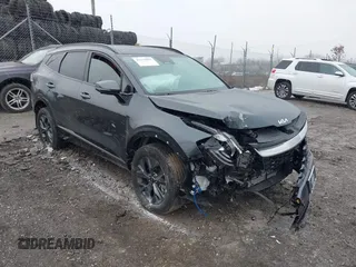 2024 Kia Sportage SX-Prestige with VIN KNDPXCDG0R7160600, listed as a IAAI auction lot 41333002 with 10,035 mi miles and . Bid and sale history available at DreamBid. Image 1.