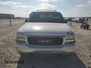2005 GMC Yukon SLT z VIN 1GKEC13T05J143724, wystawiony jako Copart lot #44611845 z przebiegiem 197 183 mil mil oraz Szkoda całkowita • Salvage title. Historia ofert i sprzedaży dostępna na DreamBid. Obrazek 5.