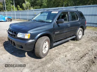 2002 Isuzu Rodeo S z VIN 4S2CK58W924321032, wystawiony jako Copart lot #66145264 z przebiegiem 184 325 mil mil oraz Szkody całkowita. Historia ofert i sprzedaży dostępna na DreamBid. Obrazek 1.
