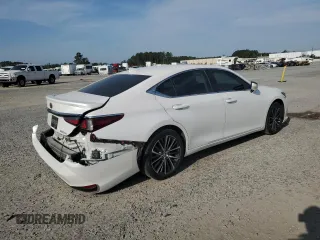 2023 Lexus ES 300h with VIN 58ADA1C10PU026761, listed as a Copart auction lot 53709735 with 137,130 mi miles and Salvage title. Bid and sale history available at DreamBid. Image 3.