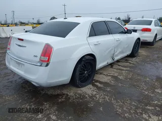 2014 Chrysler 300 with VIN 2C3CCAAG2EH235495, listed as a IAAI auction lot 41787801 with 142,354 mi miles and . Bid and sale history available at DreamBid. Image 4.