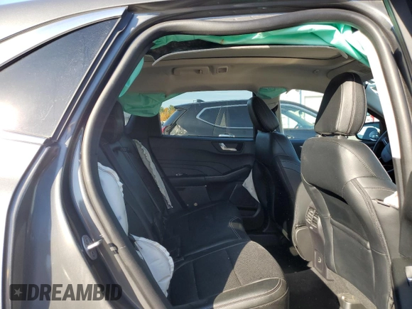 2022 Ford Escape Titanium Plug-In Hybrid with VIN 1FMCU0LZ8NUB74213, listed as a Copart auction lot 77133004 with 18,490 mi miles and Salvage title. Bid and sale history available at DreamBid. Image 11.