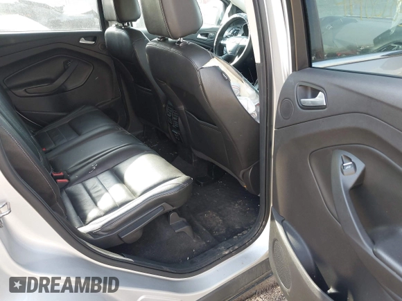 2015 Ford Escape Titanium z VIN 1FMCU0J91FUC41531, wystawiony jako IAAI lot #41903203 z przebiegiem 118 962 mil mil oraz . Historia ofert i sprzedaży dostępna na DreamBid. Obrazek 8.