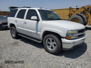 2004 Chevrolet Tahoe LS z VIN 1GNEC13T94R165160, wystawiony jako Copart lot #59994985 z przebiegiem 303 473 mil mil oraz Szkoda całkowita • Salvage title. Historia ofert i sprzedaży dostępna na DreamBid. Obrazek 4.