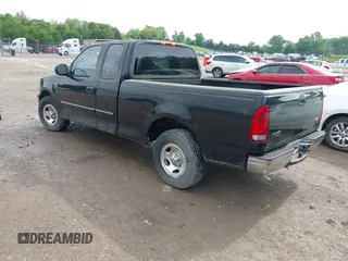 2003 Ford F-150 XL with VIN 1FTRX17263NA23449, listed as a IAAI auction lot 42111505 with 1 mi miles. Bid and sale history available at carsss.com. Image 3.
