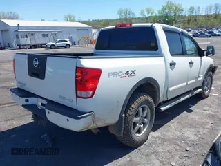 2012 Nissan Titan SV with VIN 1N6AA0EC0CN307743, listed as a IAAI auction lot 42085082 with 187,506 mi miles. Bid and sale history available at carsss.com. Image 4.