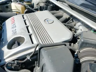2003 Lexus ES 300 z VIN JTHBF30G730103456, wystawiony jako IAAI lot #42642248 z przebiegiem 137 772 mil mil oraz . Historia ofert i sprzedaży dostępna na DreamBid. Obrazek 19.