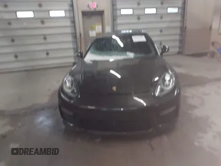 2014 Porsche Panamera GTS with VIN WP0AF2A73EL083133, listed as a IAAI auction lot 41945656 with 75,701 mi miles and . Bid and sale history available at DreamBid. Image 12.