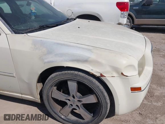 2007 Chrysler 300 Touring with VIN 2C3KA53GX7H743920, listed as a IAAI auction lot 42242462 with Not Provided miles and . Bid and sale history available at DreamBid. Image 6.
