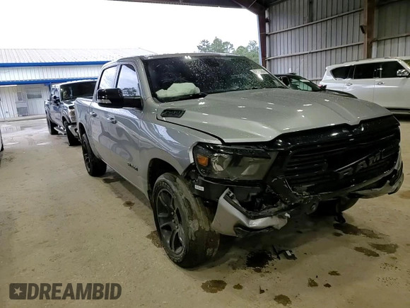 2021 Ram 1500 Big Horn z VIN 1C6RREFT7MN708516, wystawiony jako Copart lot #57719405 z przebiegiem 65 000 mil mil oraz Szkoda całkowita • Salvage title. Historia ofert i sprzedaży dostępna na DreamBid. Obrazek 13.