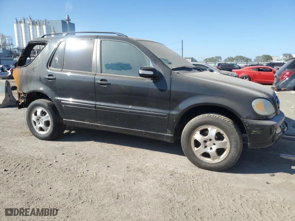 2003 Mercedes-Benz M-Class 3.7L with VIN 4JGAB57E73A425089, listed as a Copart auction lot 69558274 with 188,468 mi miles and Salvage Title. Bid and sale history available at carsss.com. Image 4.