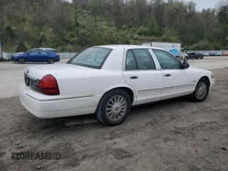 2010 Mercury Grand Marquis LS z VIN 2MEBM7FV2AX606751, wystawiony jako Copart lot #52798295 z przebiegiem 100 616 mil mil oraz Szkody całkowita. Historia ofert i sprzedaży dostępna na DreamBid. Obrazek 3.