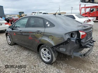 2018 Ford Fiesta SE z VIN 3FADP4BJ1JM115298, wystawiony jako Copart lot #76737564 z przebiegiem Nie podano mil oraz Szkoda całkowita • Salvage title. Historia ofert i sprzedaży dostępna na DreamBid. Obrazek 2.