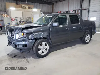 2013 Honda Ridgeline RTL with VIN 5FPYK1F57DB016202, listed as a Copart auction lot 48349095 with 35,880 mi miles and Salvage Title. Bid and sale history available at carsss.com. Image 1.