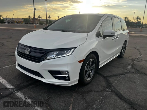 2019 Honda Odyssey Touring z VIN 5FNRL6H86KB053432, wystawiony jako Copart lot #65482425 z przebiegiem 87 470 mil mil oraz Szkoda całkowita • Salvage title. Historia ofert i sprzedaży dostępna na DreamBid. Obrazek 2.