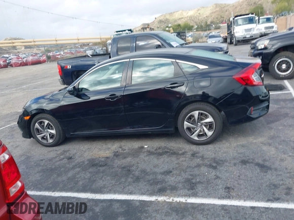 2020 Honda Civic Sedan LX with VIN 2HGFC2F69LH530736, listed as a IAAI auction lot 41765663 with 138,576 mi miles. Bid and sale history available at carsss.com. Image 14.