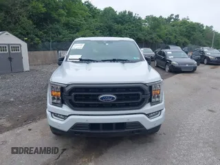 2021 Ford F-150 XL z VIN 1FTEW1EP5MKE17091, wystawiony jako IAAI lot #42413293 z przebiegiem 57 042 mil mil oraz . Historia ofert i sprzedaży dostępna na DreamBid. Obrazek 13.