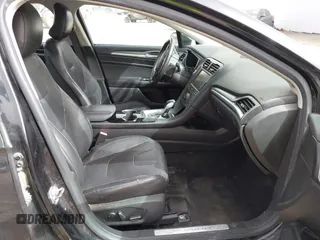 2015 Ford Fusion Titanium with VIN 3FA6P0K99FR268450, listed as a IAAI auction lot 41805513 with 202,009 mi miles. Bid and sale history available at carsss.com. Image 5.
