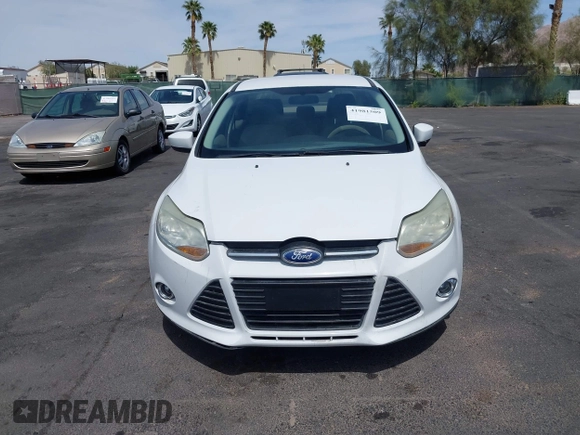 2012 Ford Focus SE with VIN 1FAHP3F24CL462319, listed as a IAAI auction lot 41981509 with 124,831 mi miles. Bid and sale history available at carsss.com. Image 12.
