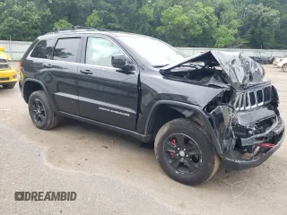 2016 Jeep Grand Cherokee Laredo with VIN 1C4RJEAG4GC394091, listed as a Copart auction lot 56595165 with 134,135 mi miles and Salvage title. Bid and sale history available at DreamBid. Image 4.