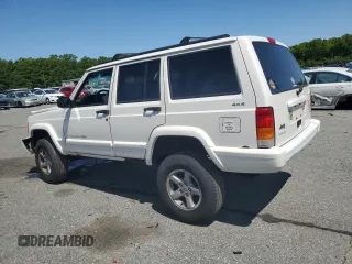 1998 Jeep Cherokee Sport with VIN 1J4FJ68S8WL116368, listed as a Copart auction lot 59228735 with 113,546 mi miles and Salvage title. Bid and sale history available at DreamBid. Image 2.