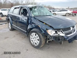 2013 Dodge Journey SE z VIN 3C4PDCAB7DT701180, wystawiony jako IAAI lot #41609700 z przebiegiem 118 207 mil mil oraz . Historia ofert i sprzedaży dostępna na DreamBid. Obrazek 6.