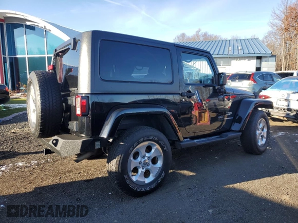 2014 Jeep Wrangler Sahara with VIN 1C4AJWBG9EL102983, listed as a Copart auction lot 84501554 with 120,372 mi miles and Salvage Title. Bid and sale history available at DreamBid. Image 3.