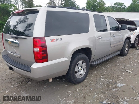 2007 Chevrolet Suburban LS with VIN 1GNFC16J97R179742, listed as a IAAI auction lot 42223885 with 182,718 mi miles and . Bid and sale history available at DreamBid. Image 4.