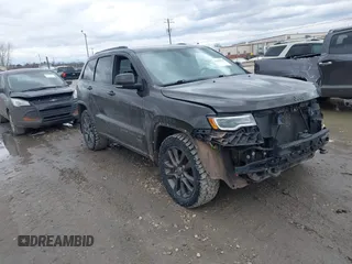 2016 Jeep Grand Cherokee Limited z VIN 1C4RJFBG5GC406494, wystawiony jako IAAI lot #41662039 z przebiegiem 139 944 mil mil oraz . Historia ofert i sprzedaży dostępna na DreamBid. Obrazek 1.