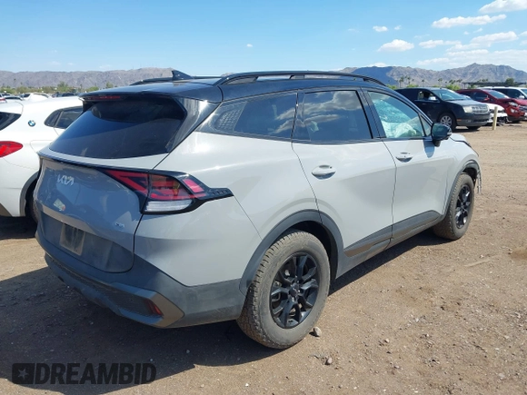 2023 Kia Sportage X-Pro Prestige z VIN 5XYK7CAF7PG091605, wystawiony jako IAAI lot #42414577 z przebiegiem 43 120 mil mil oraz . Historia ofert i sprzedaży dostępna na DreamBid. Obrazek 4.