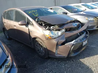 2015 Toyota Prius Two with VIN JTDZN3EU4FJ040526, listed as a IAAI auction lot 41582274 with 137,797 mi miles and . Bid and sale history available at DreamBid. Image 1.