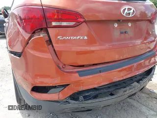 2017 Hyundai Santa Fe 2.4L z VIN 5XYZUDLB1HG463416, wystawiony jako IAAI lot #42546637 z przebiegiem 81 963 mil mil oraz . Historia ofert i sprzedaży dostępna na DreamBid. Obrazek 6.