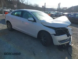 2018 Volvo S60 Inscription Platinum with VIN LYV402HM7JB179307, listed as a IAAI auction lot 41793753 with 107,205 mi miles. Bid and sale history available at carsss.com. Image 1.