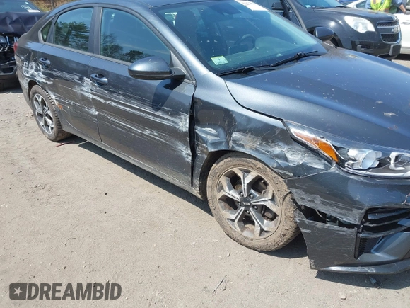 2019 Kia Forte LXS z VIN 3KPF24AD4KE081480, wystawiony jako IAAI lot #42073063 z przebiegiem 100 605 mil mil oraz . Historia ofert i sprzedaży dostępna na DreamBid. Obrazek 6.