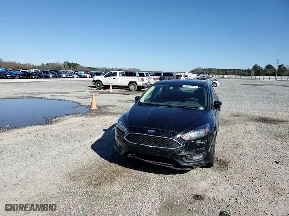 2017 Ford Focus SEL with VIN 1FADP3H22HL221202, listed as a Copart auction lot 48403875 with 128,959 mi miles and Salvage Title. Bid and sale history available at carsss.com. Image 10.