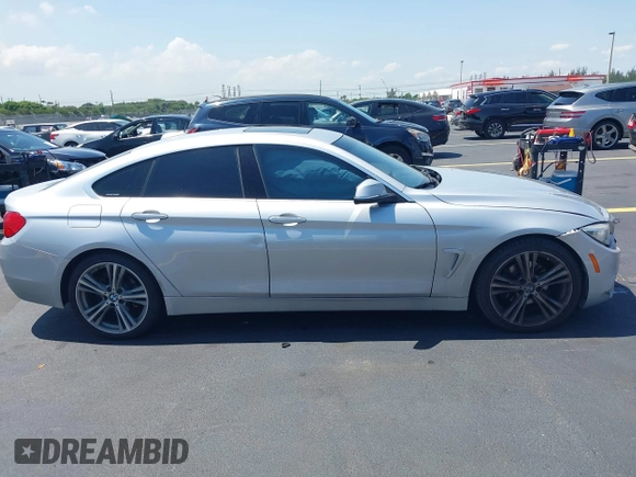 2016 BMW 4 Series 428i with VIN WBA4A9C54GG506519, listed as a IAAI auction lot 42288722 with 116,863 mi miles and . Bid and sale history available at DreamBid. Image 13.