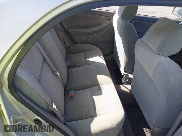 2003 Toyota Corolla CE with VIN 1NXBR32E23Z015648, listed as a IAAI auction lot 42056596 with 287,999 mi miles and . Bid and sale history available at DreamBid. Image 8.