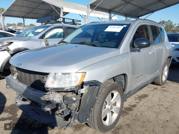 2011 Jeep Compass with VIN 1J4NT1FA4BD139153, listed as a IAAI auction lot 41665481 with 164,412 mi miles. Bid and sale history available at carsss.com. Image 18.