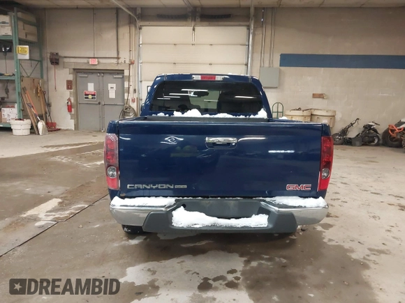 2011 GMC Canyon SLE1 with VIN 1GTH6MFE3B8123808, listed as a IAAI auction lot 41611231 with 142,877 mi miles. Bid and sale history available at carsss.com. Image 16.