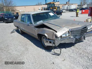 1992 Cadillac Brougham z VIN 1G6DW5477NR702648, wystawiony jako IAAI lot #41863168 z przebiegiem 108 158 mil mil oraz . Historia ofert i sprzedaży dostępna na DreamBid. Obrazek 6.
