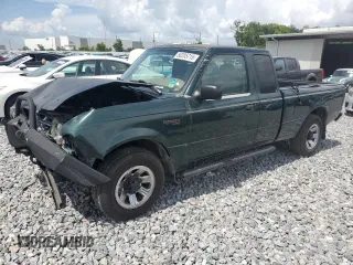 2002 Ford Ranger XLT Appearance with VIN 1FTYR44E42TA32828, listed as a Copart auction lot 60205715 with 290,846 mi miles and Salvage title. Bid and sale history available at DreamBid. Image 1.