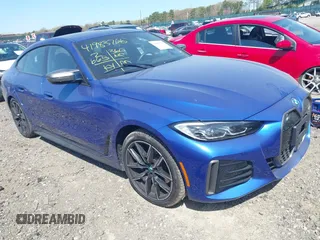 2024 BMW i4 M50 z VIN WBY33AW09RFS60679, wystawiony jako IAAI lot #41983706 z przebiegiem 2665 mil mil oraz . Historia ofert i sprzedaży dostępna na DreamBid. Obrazek 1.