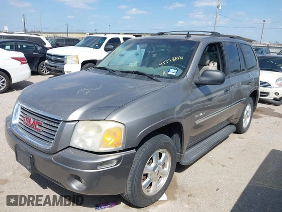 2006 GMC Envoy SLT with VIN 1GKDS13S462185122, listed as a IAAI auction lot 41778816 with 220,974 mi miles. Bid and sale history available at carsss.com. Image 2.