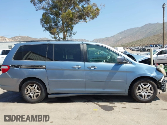 2007 Honda Odyssey EX-L with VIN 5FNRL38727B142735, listed as a IAAI auction lot 42093062 with 195,653 mi miles and . Bid and sale history available at DreamBid. Image 13.