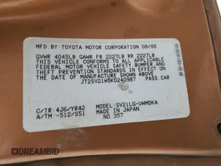 1989 Toyota Camry z VIN JT2SV21W5K0240987, wystawiony jako Copart lot #42248385 z przebiegiem 246 651 mil mil oraz Czysty tytuł • Clean title. Historia ofert i sprzedaży dostępna na DreamBid. Obrazek 13.